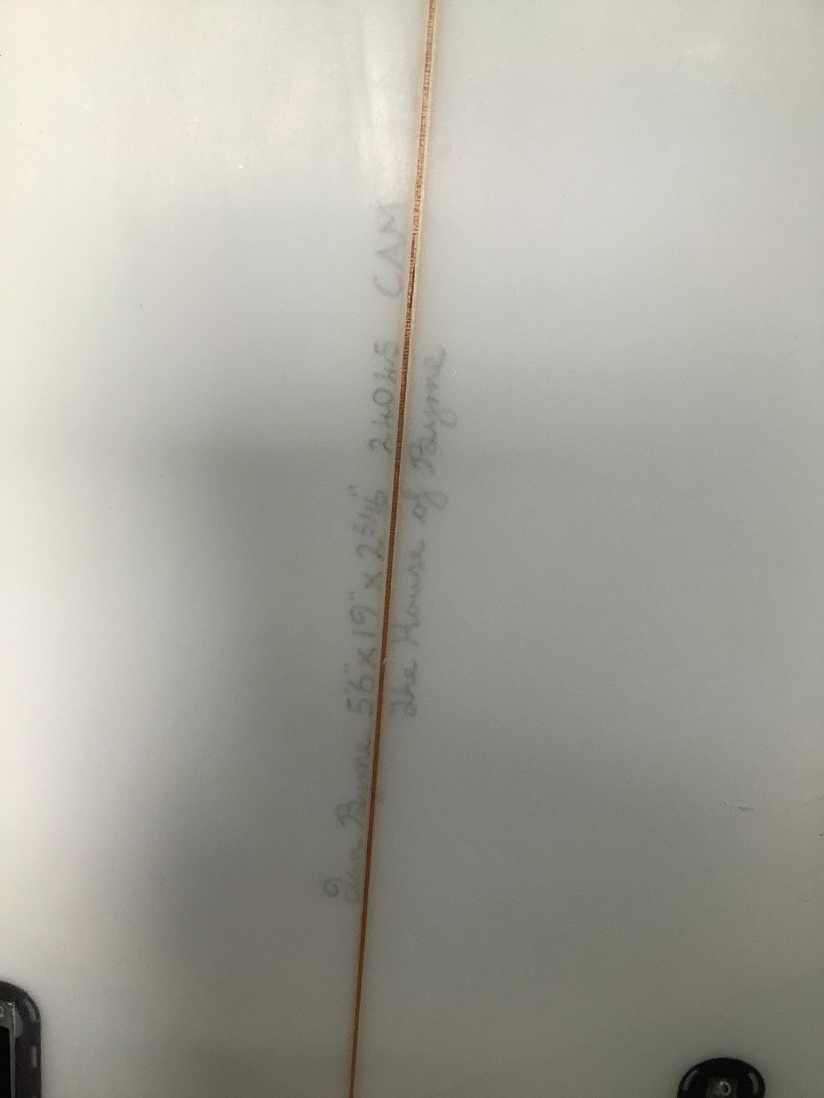 Handwritten dimensions on The House of Byrne used surfboard