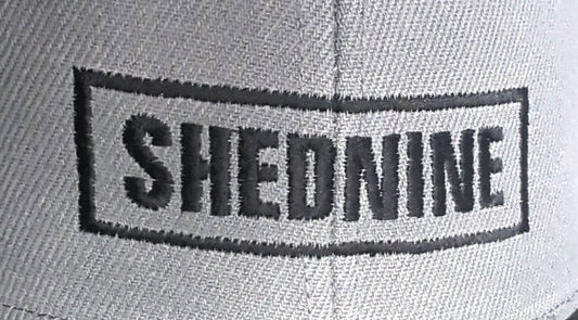 Shed Nine Metal Snap Back Cap - Shed Nine
