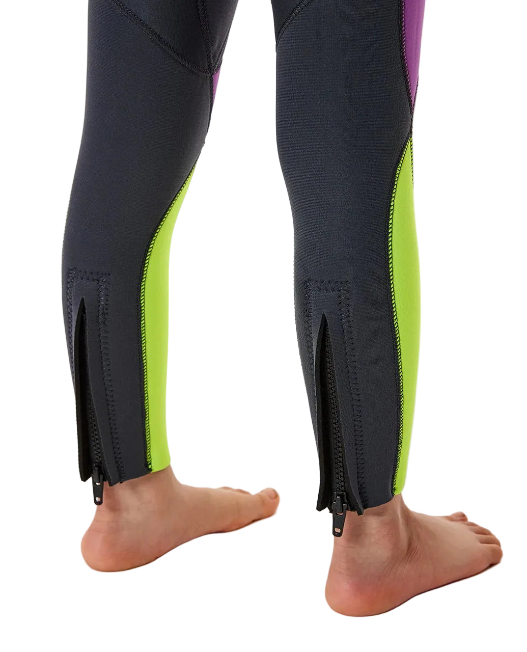 Black leggings with green side panels worn by a person on a white shed ninebackground
