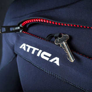 Navy blue Attica wetsuit with a key attached to the zipper shed nine