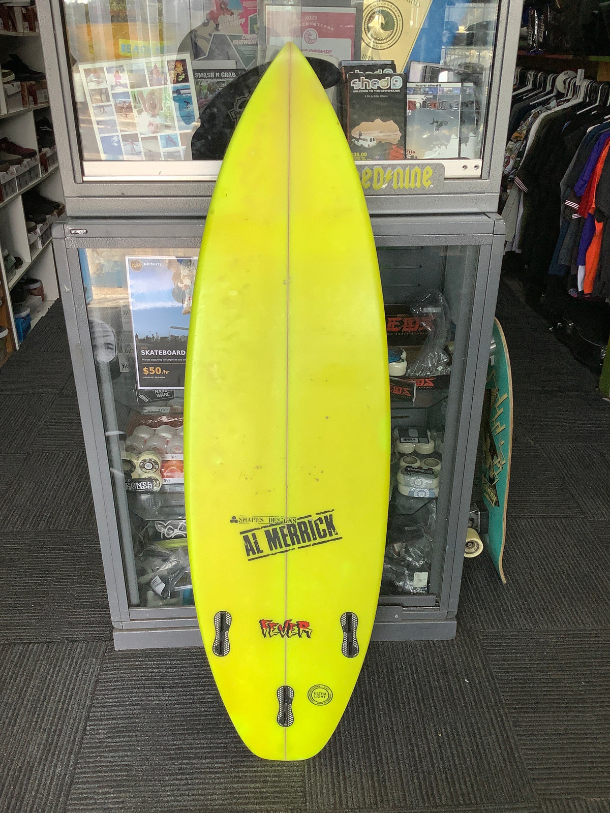 Used Al Merrick Fever surfboard underside and fin boxes