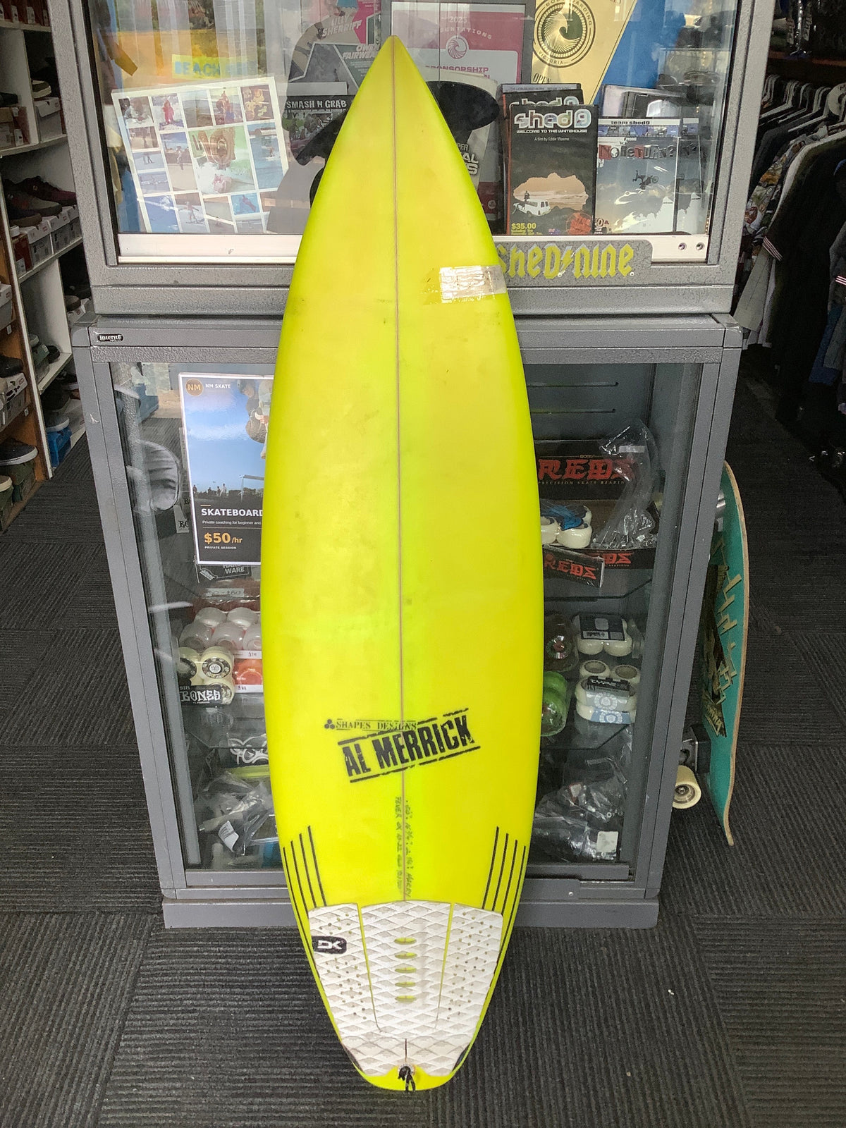 Used Al Merrick Fever surfboard deck with white traction pad