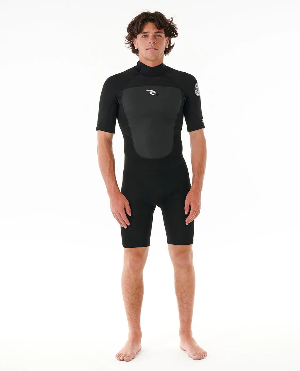 Person wearing a black wetsuit on a white background SHED NINE