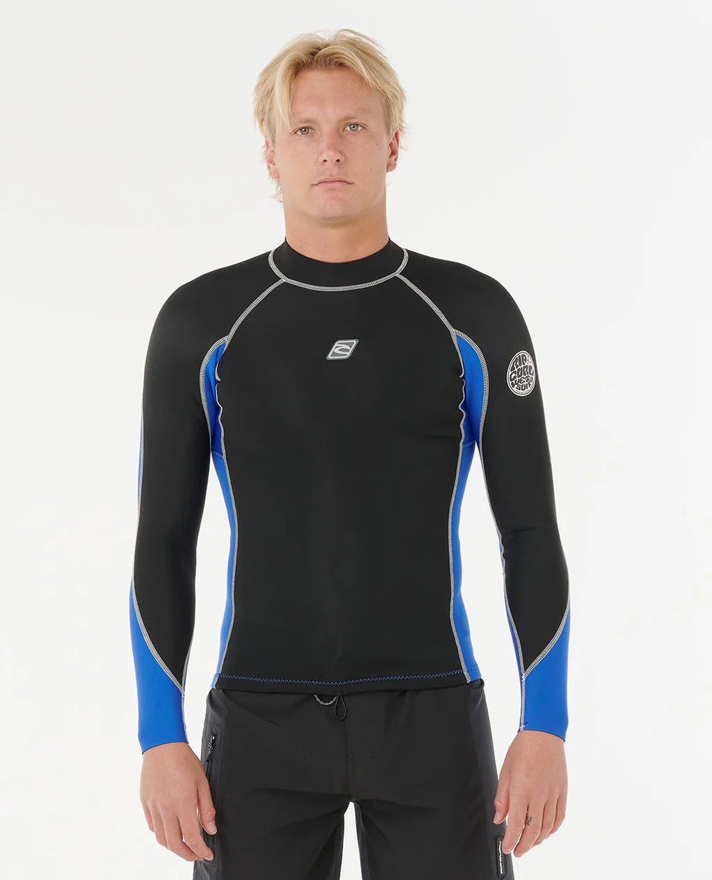 Man wearing a black and blue long-sleeve rash guard on a white background SHED NINE