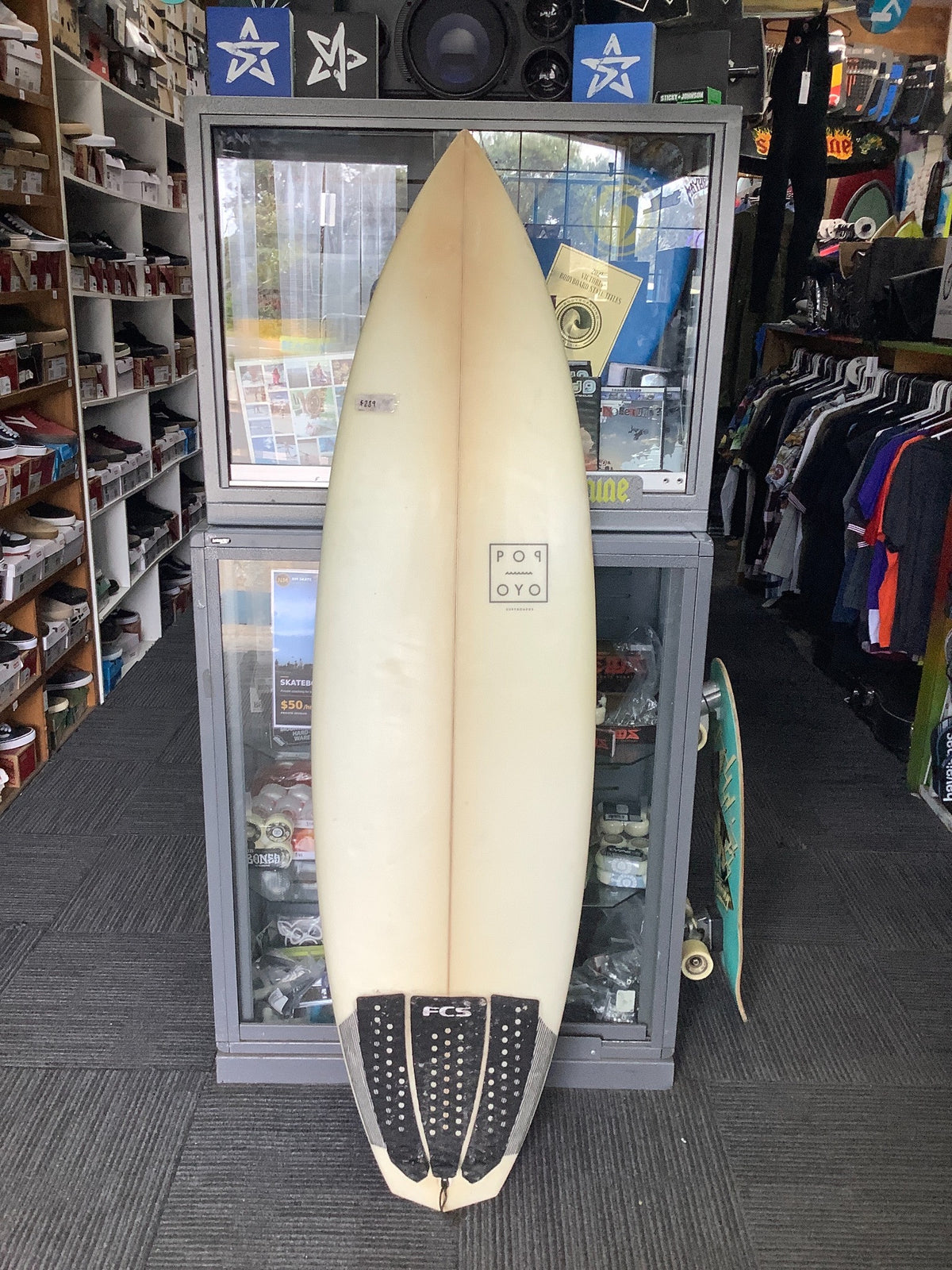 Second-hand 6'0 surfboard deck with black tail pad