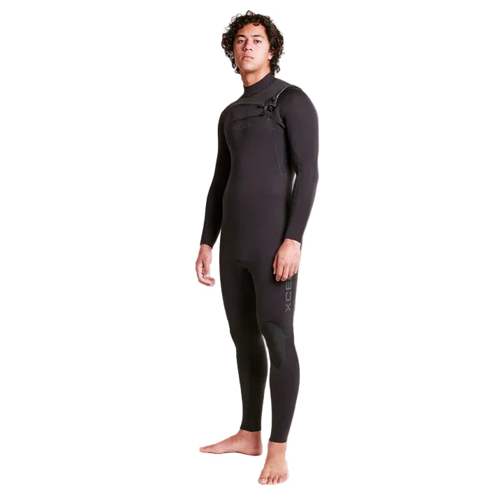 Person wearing a black wetsuit on a gray background shed nine