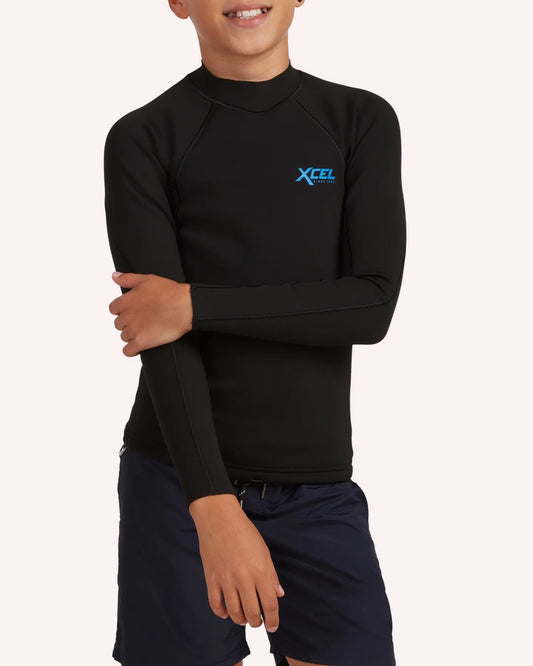 Child wearing a black XCEL wetsuit on a white background