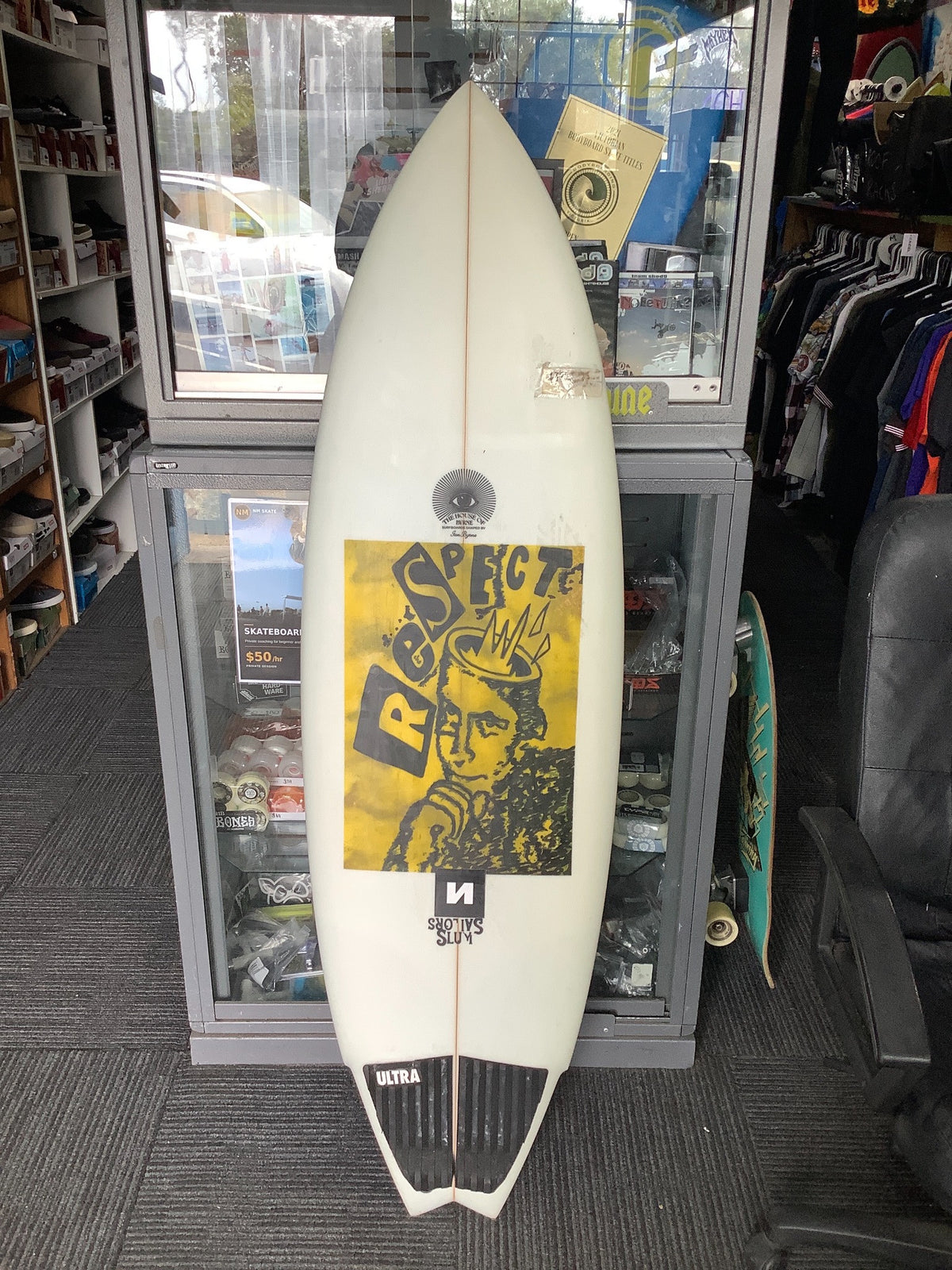 The House of Byrne used 5 ft 6 surfboard deck with yellow graphic and black tail pad
