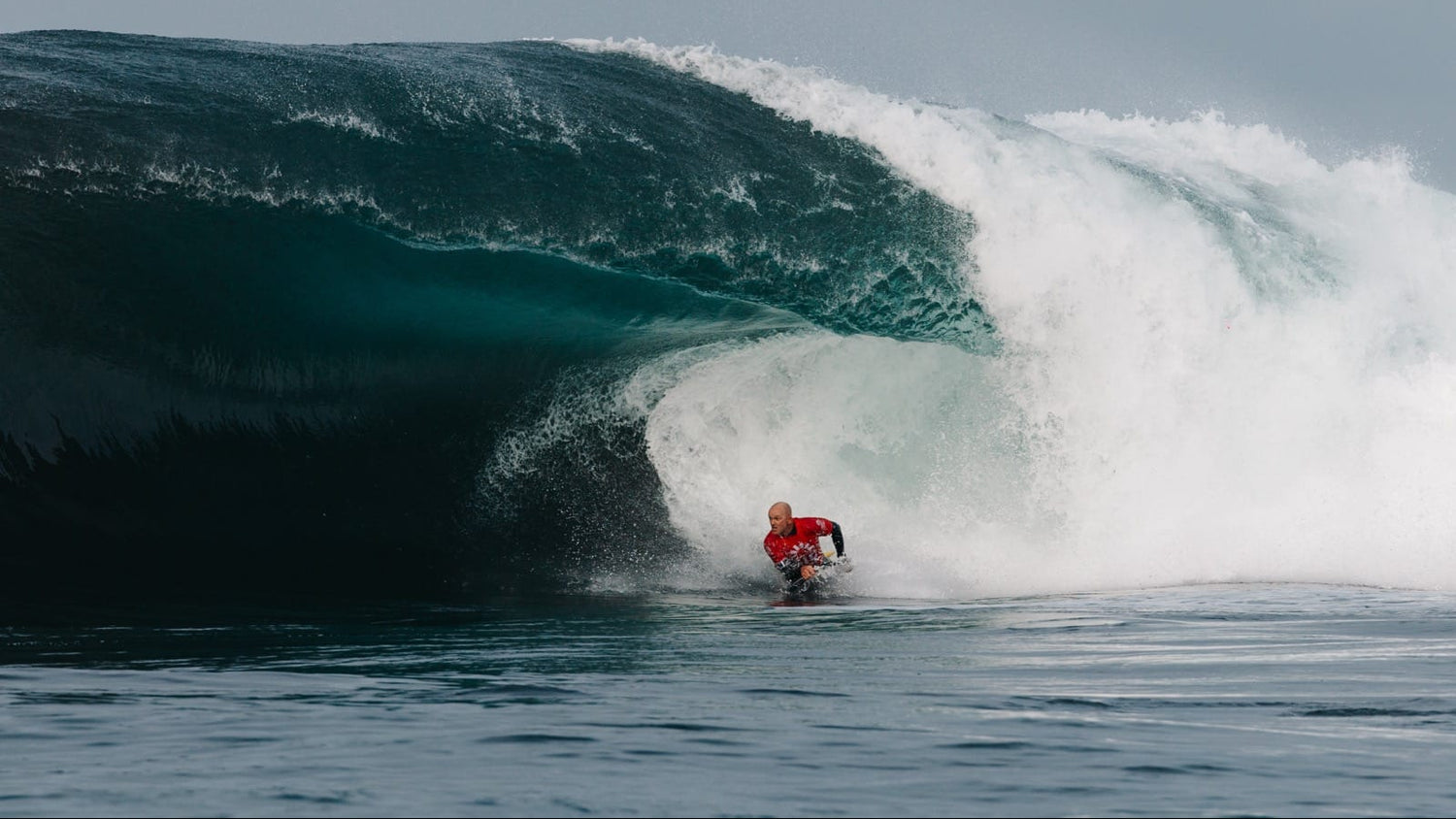 Person surfing a large wave in the ocean King At The Island  Matt Viesis Photo shed nine