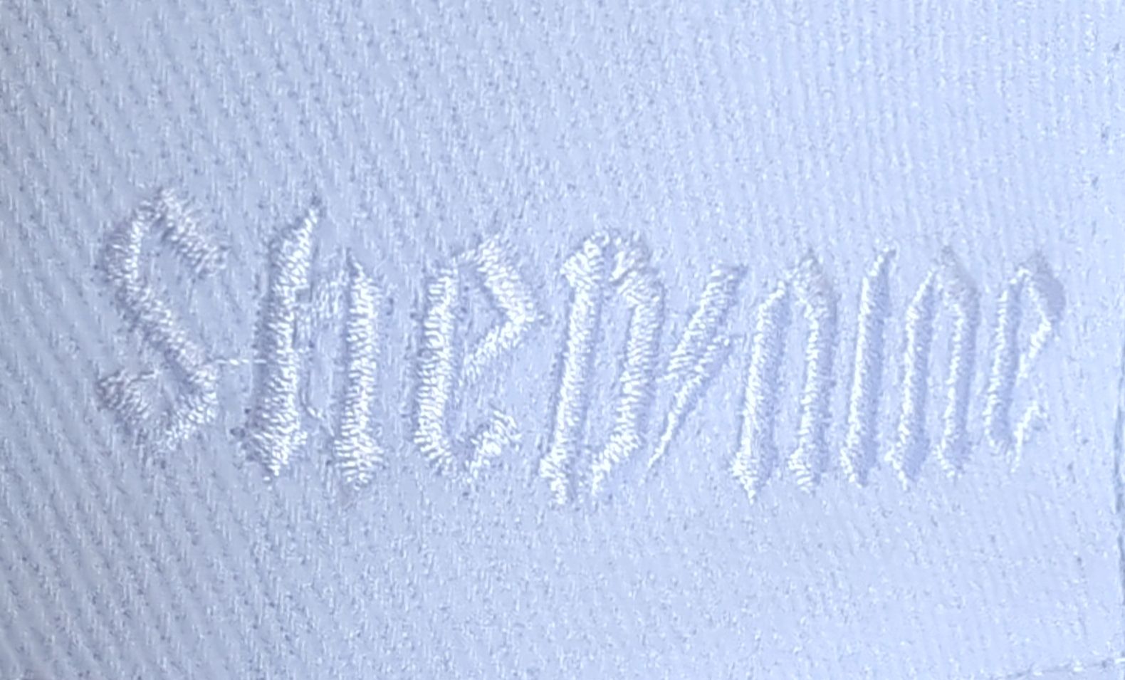 Shed Nine White Buckle Cap Lighting Logo - Shed Nine