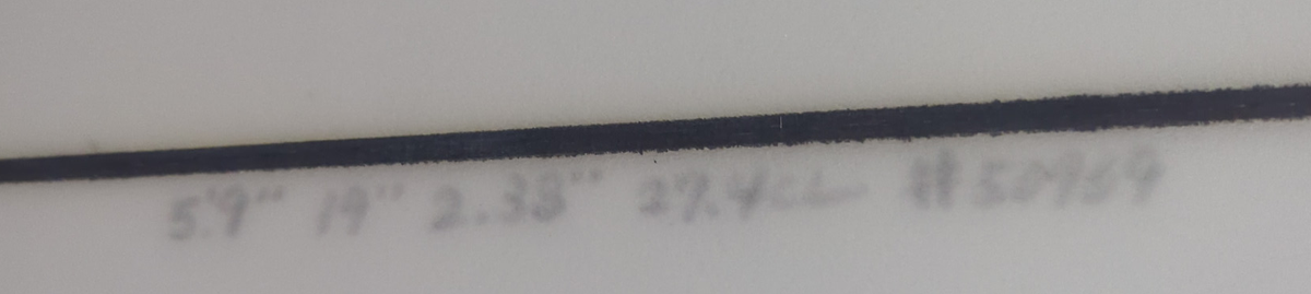 Original handwritten markings on the Lost Mayhem surfboard