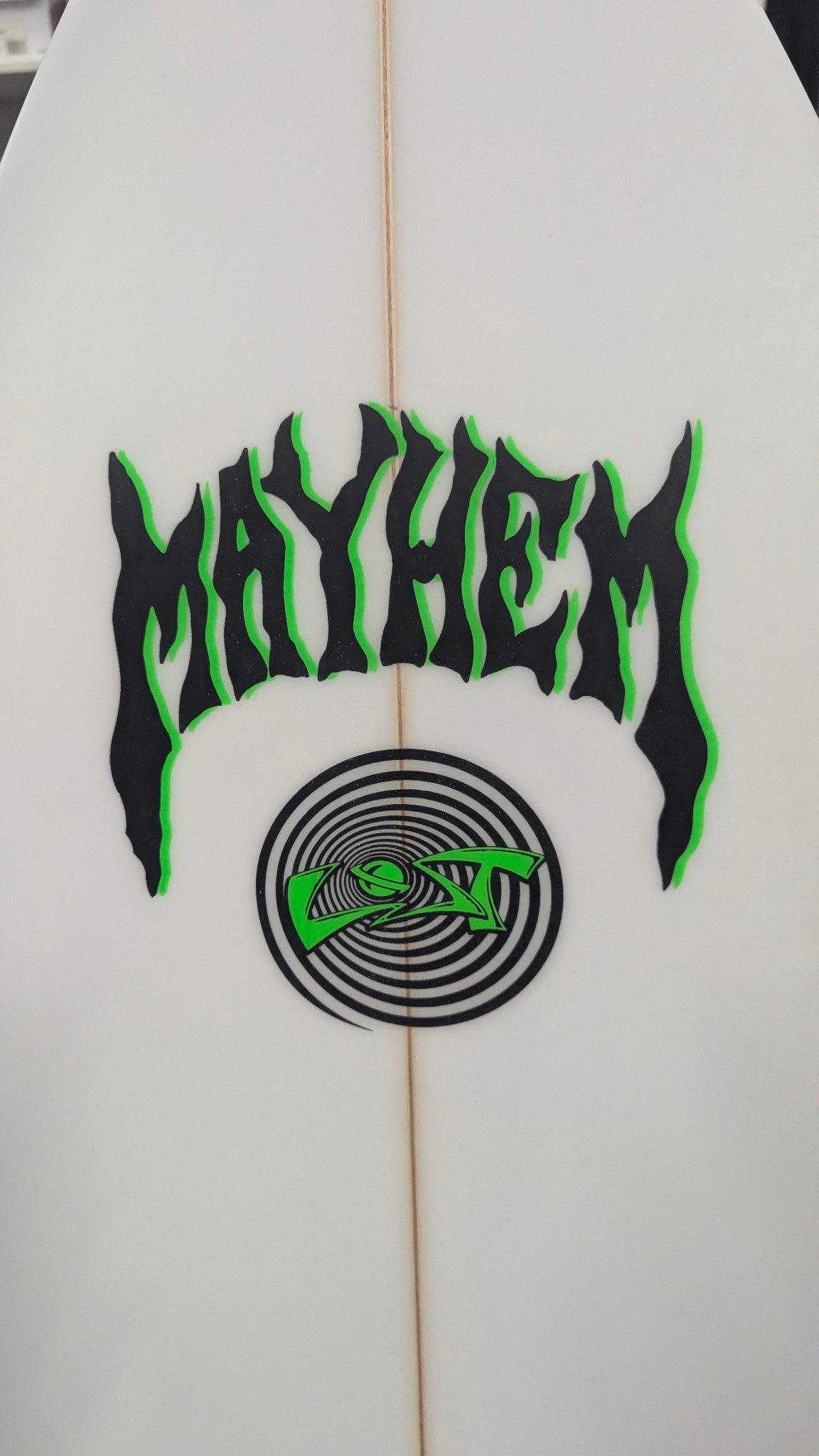 Black and neon-green Mayhem logo on the actual board