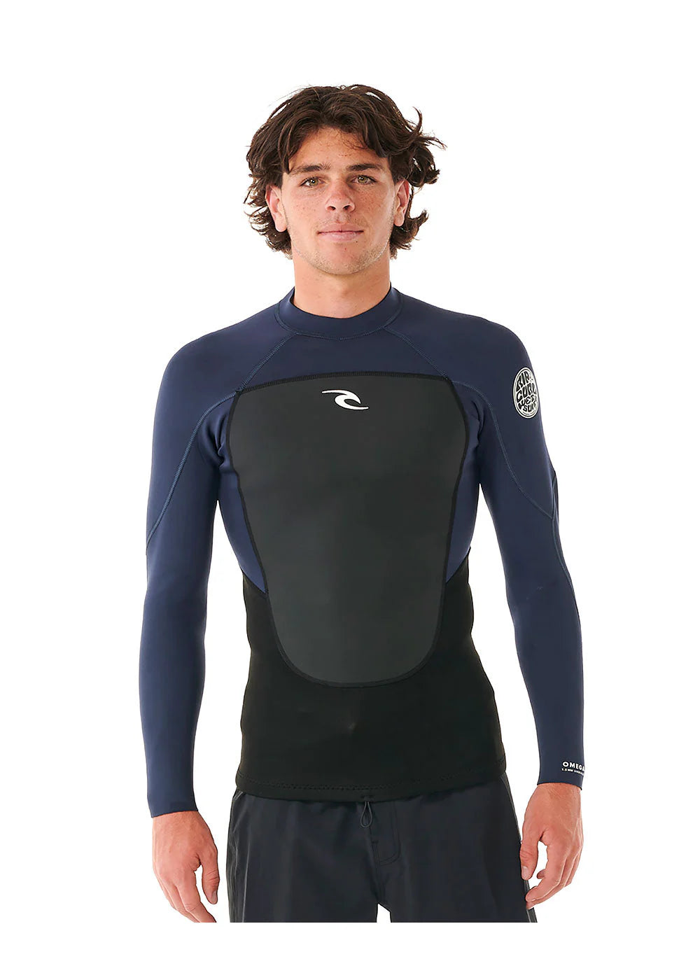 Man wearing a navy and black wetsuit with Rip Curl logo on a white background shed nine