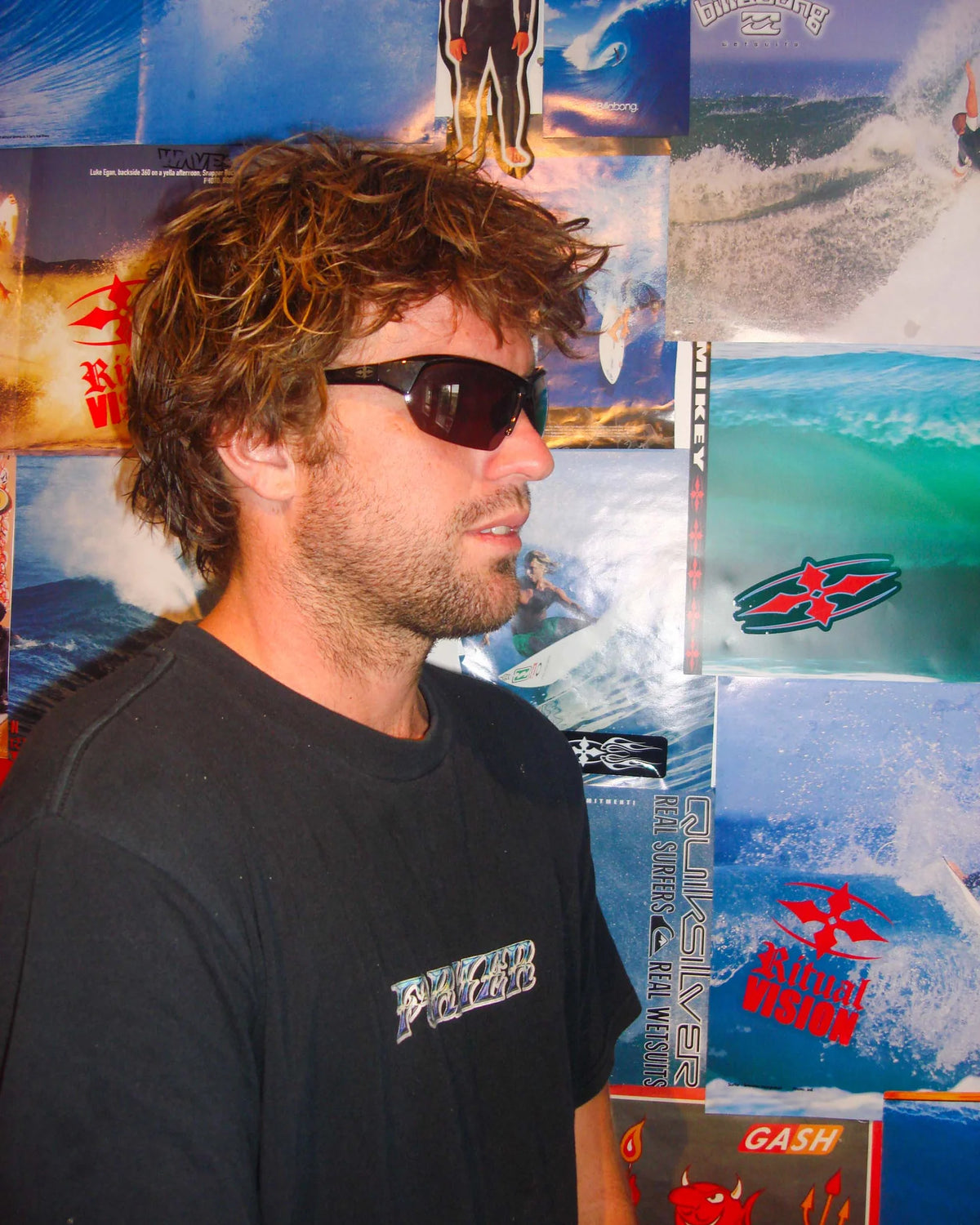Portrait of model wearing Ritual Vision Break & Enter Sunglasses in Metallic Black / Bronze shed nine