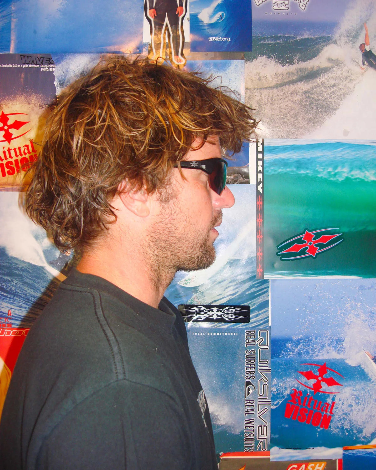 Side portrait of model wearing Ritual Vision Break & Enter Sunglasses in Metallic Black / Bronze shed nine