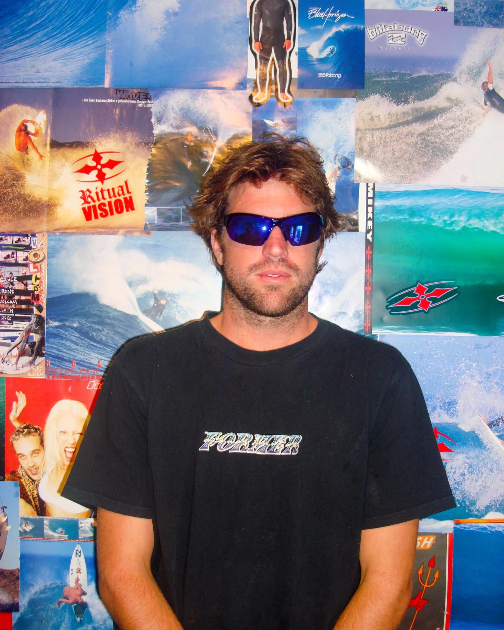 Front portrait of model wearing Ritual Vision Break & Enter Sunglasses in Polished Black / Reflective Blue shed nine