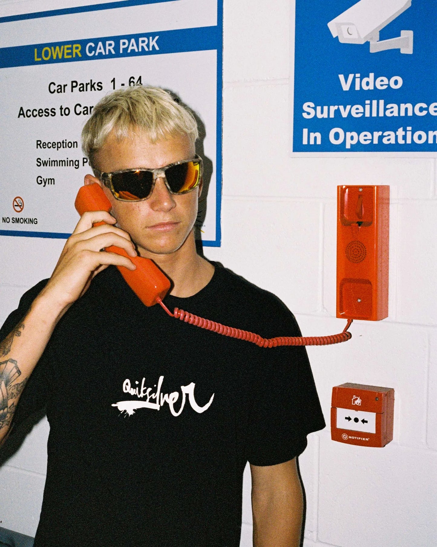 Event portrait of model wearing Ritual Vision The Decline Sunglasses in Black / Black Polarised 63 mm shed nine