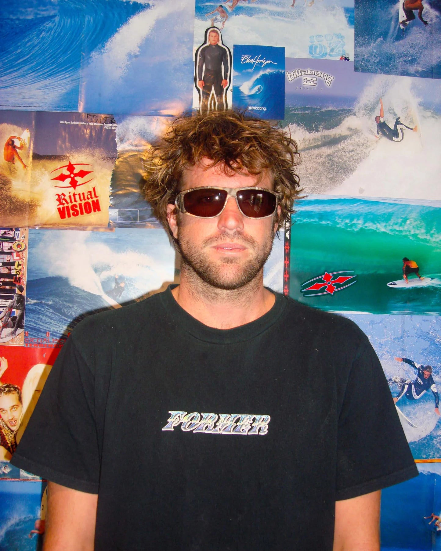 Lifestyle portrait of model wearing Ritual Vision The Vacationer Sunglasses in Combat / Olive Polarised shed nine