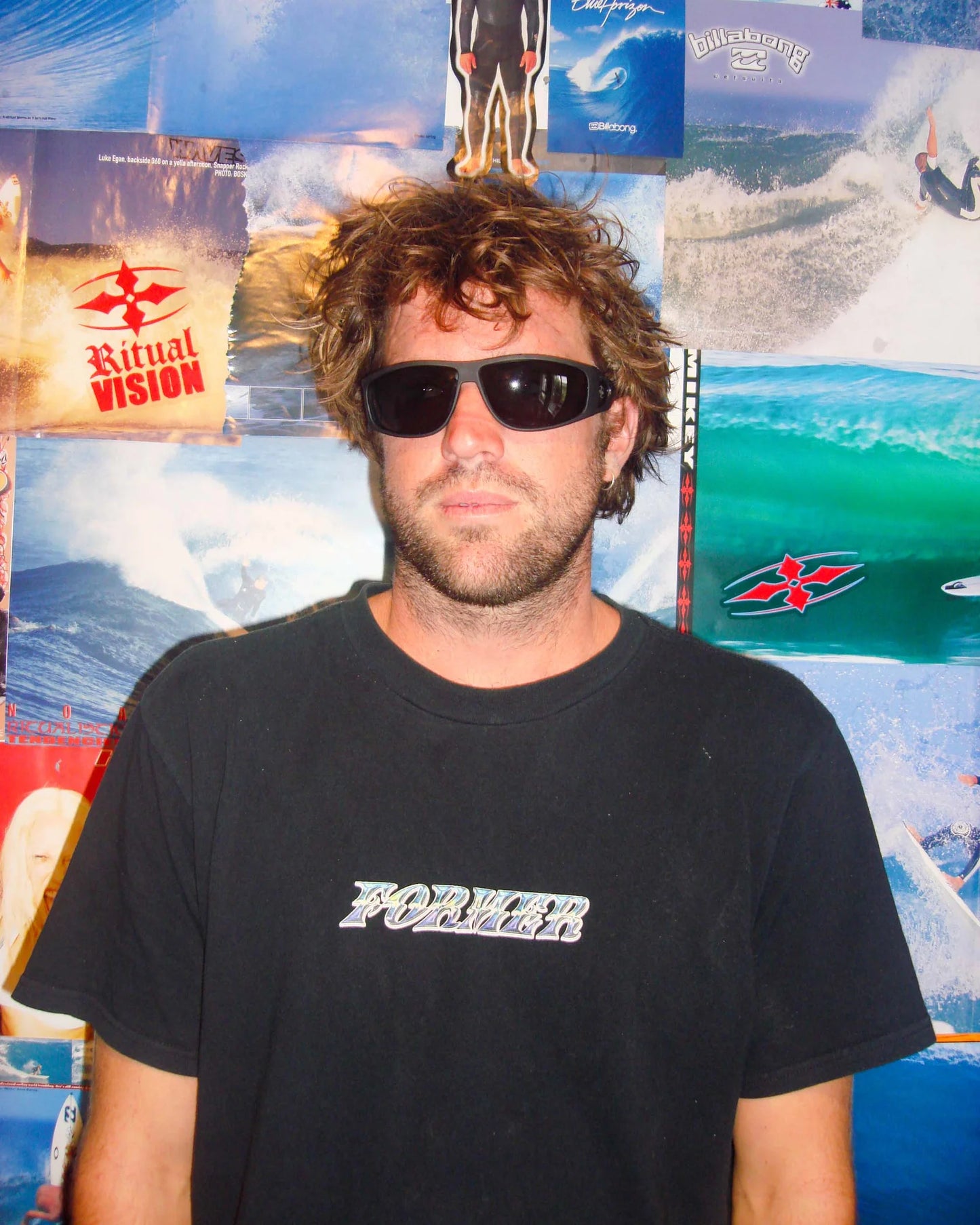 Lifestyle portrait of model wearing Ritual Vision The Vacationer Sunglasses in Matte Black / Black Polarised shed nine