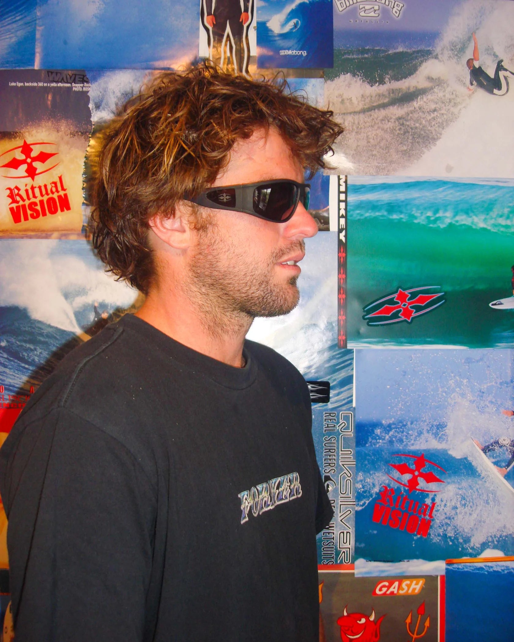 Side portrait of model wearing Ritual Vision The Vacationer Sunglasses in Matte Black / Black Polarised shed nine