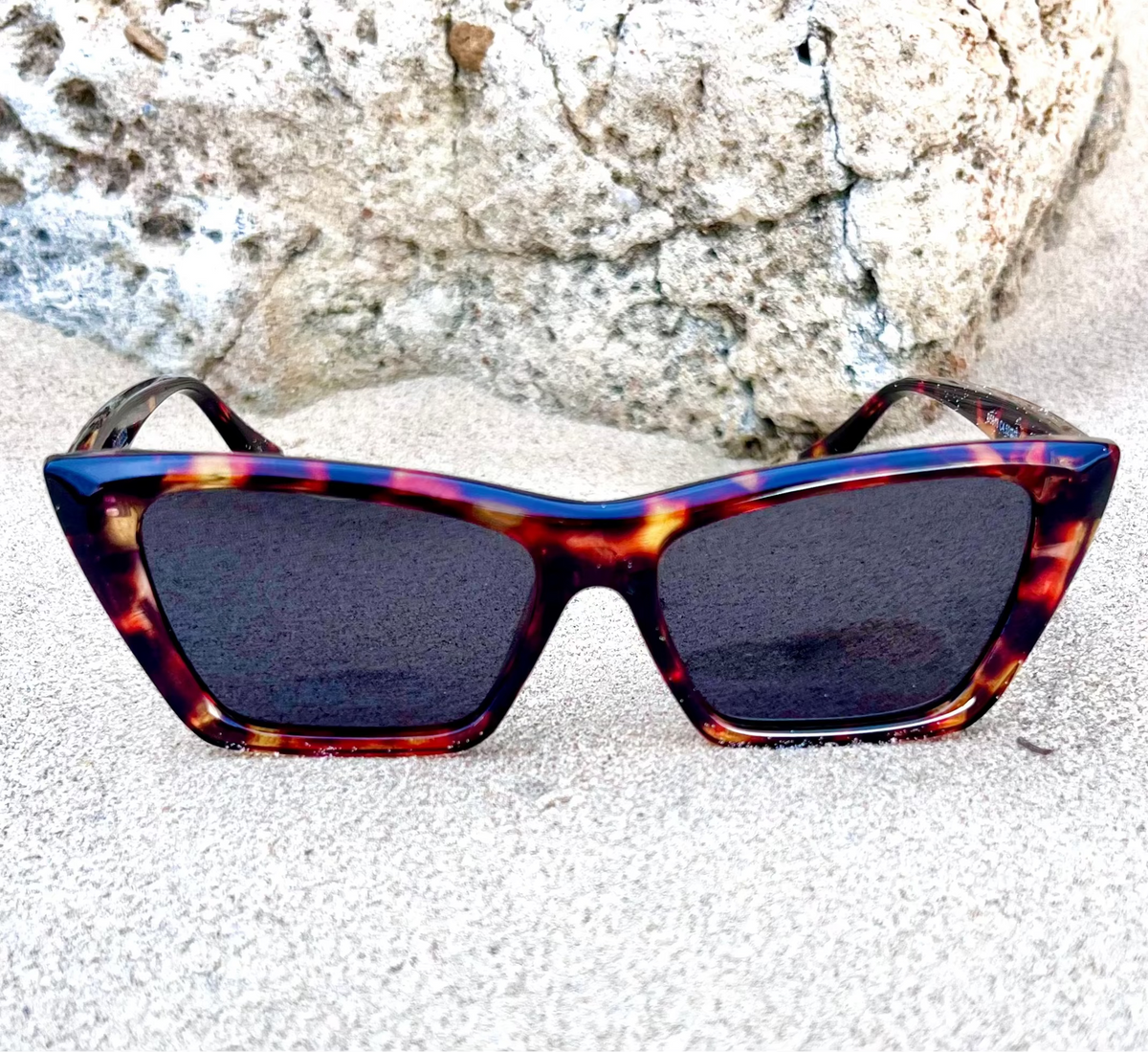 Salty Minds Seabreeze tortoise sunglasses, front view on sand