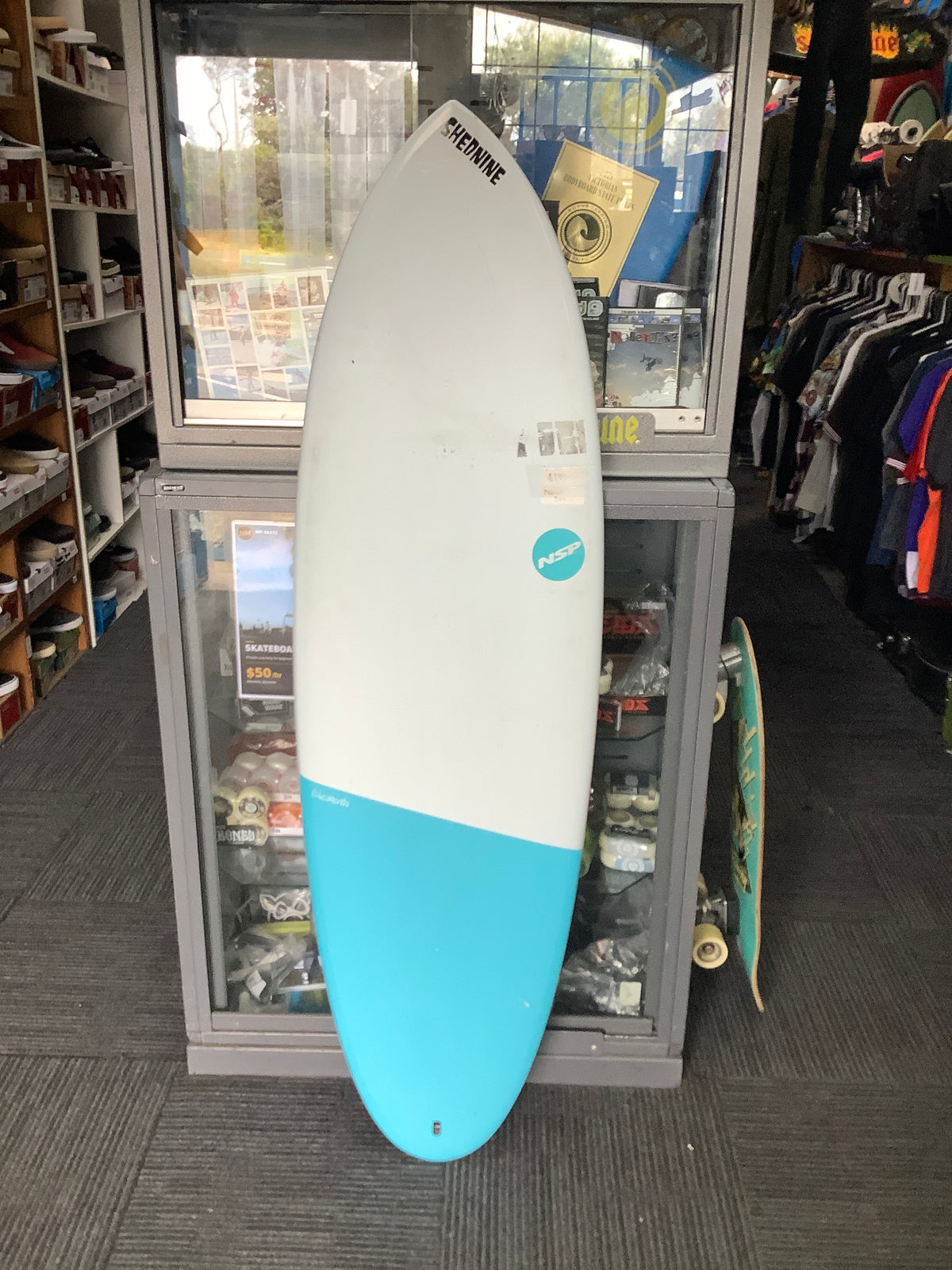 Second-hand NSP Hybrid blue and white surfboard deck