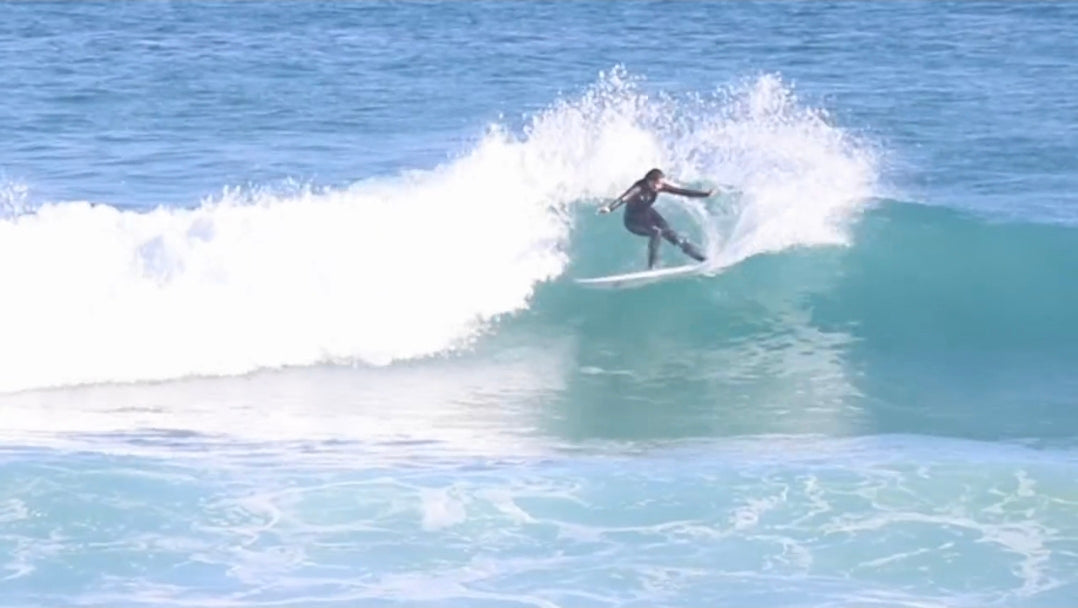 Shed 9 team rider Luka Woods surfing a clean ocean wave