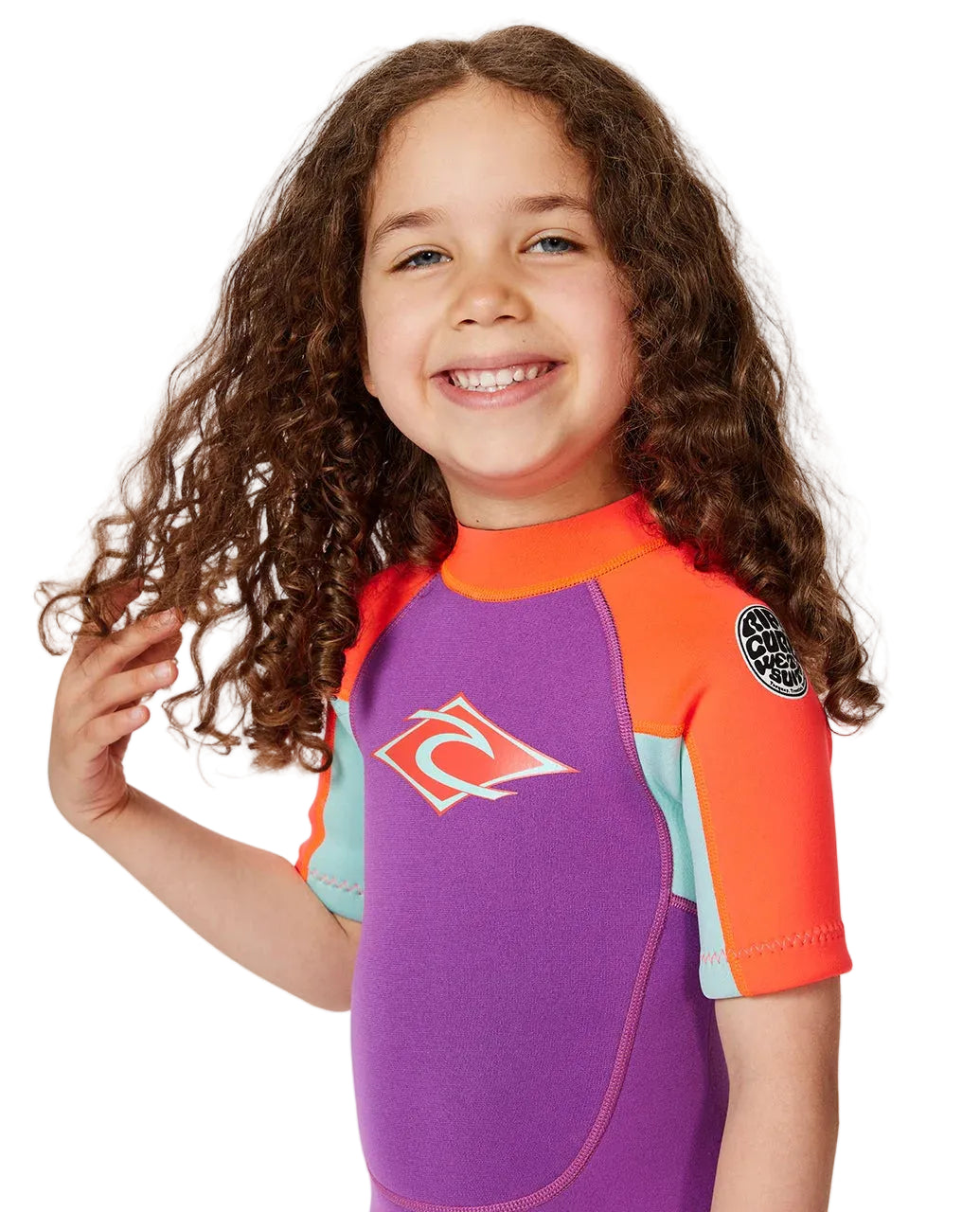 Child wearing a colorful wetsuit with a visible brand logo on a white  shed ninebackground