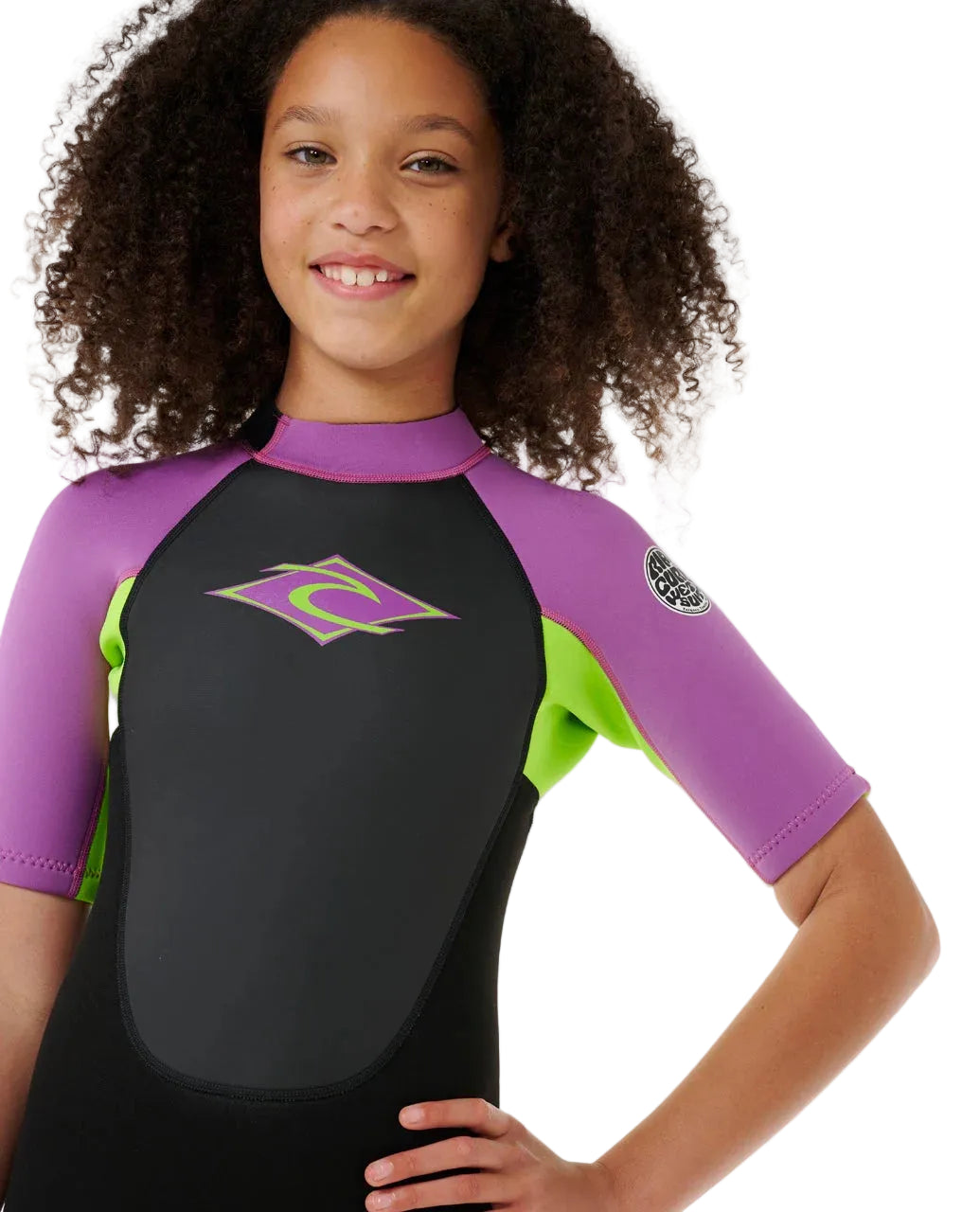 Child wearing a black and purple wetsuit with a logo on a white background shed nine