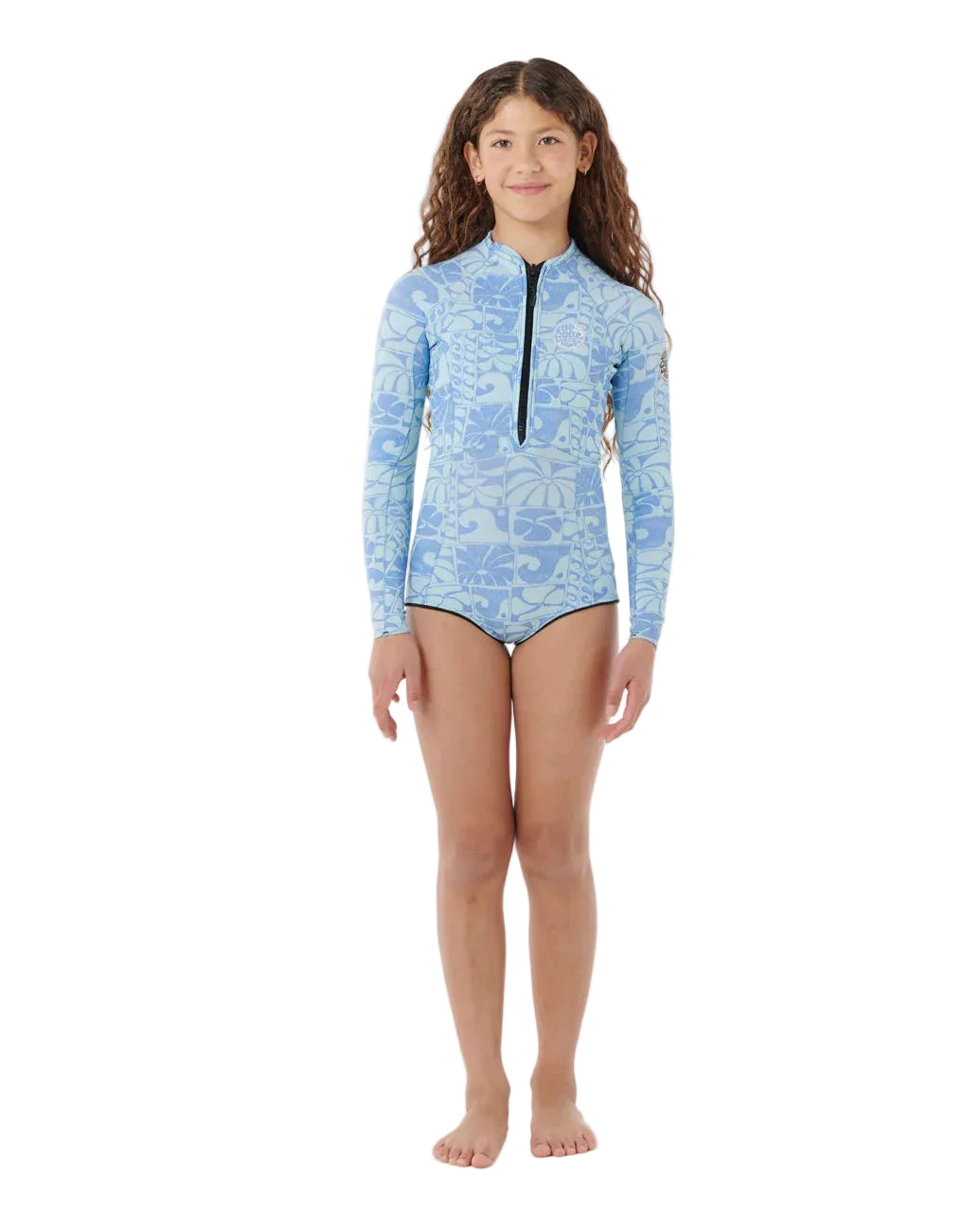 Girl wearing a blue rash guard with a floral pattern on a white background shed nine