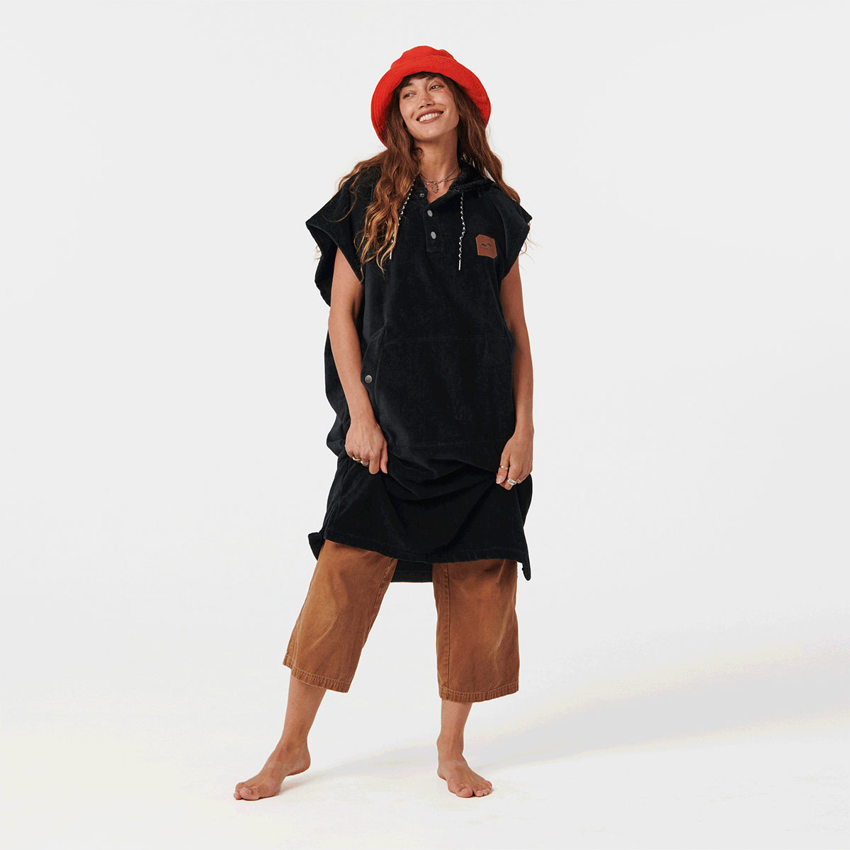 Slowtide The Digs changing poncho in Black, front view