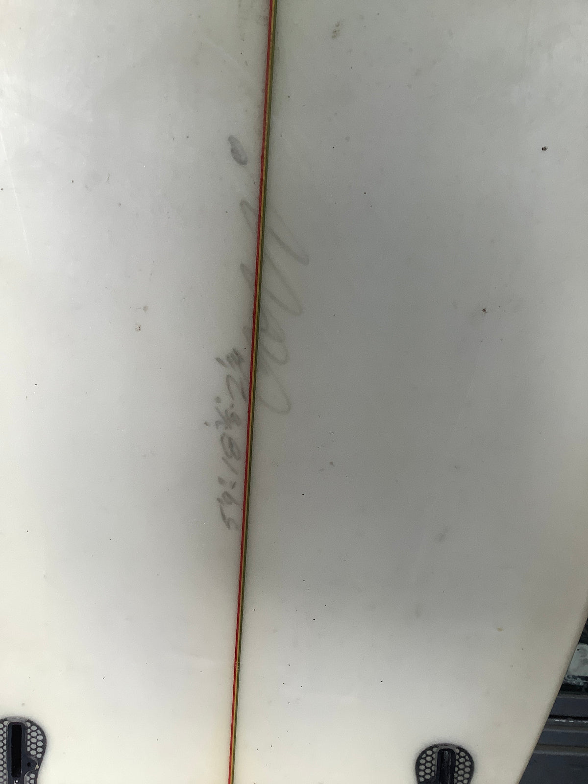 PISC Asylum used surfboard close-up of faint handwritten dimensions beside stringer