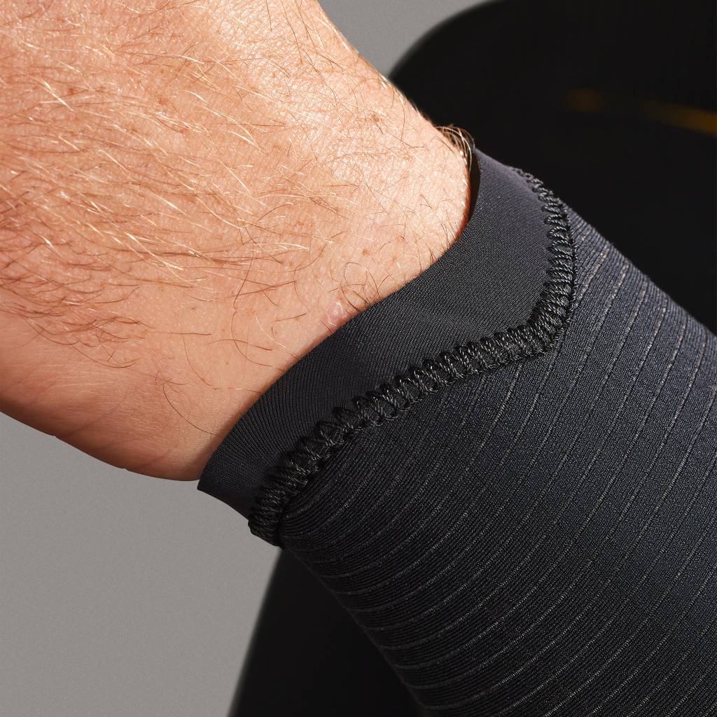 Ankle cuff detail of Xcel Men’s Drylock 3/2mm Chest Zip Steamer Wetsuit in black shed nine