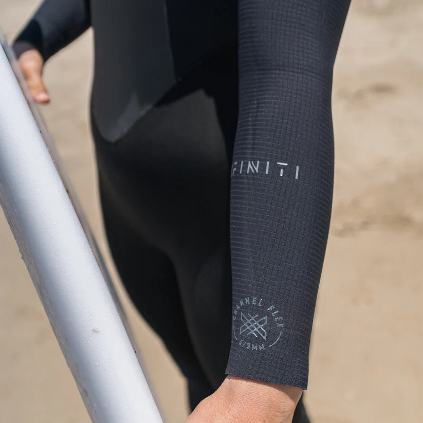 Arm logo detail on Xcel Women’s Infiniti Front Zip 4/3mm Full Wetsuit in black Shed Nine