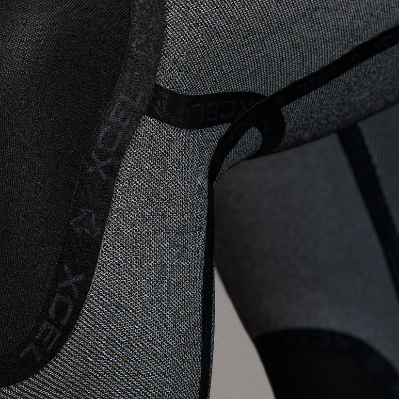 Front zip detail on Xcel Women’s Infiniti knee seem 4/3mm Full Wetsuit in black Shed Nine